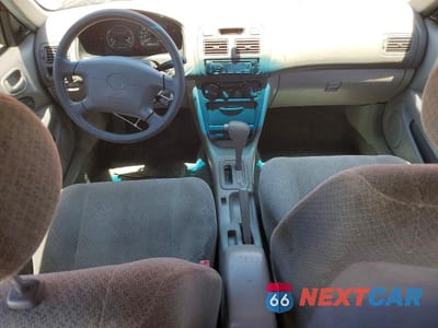 Zdjęcie 8 z 13 samochodu: 2000 TOYOTA COROLLA VE VIN:1NXBR12E3YZ350557 - miniatura