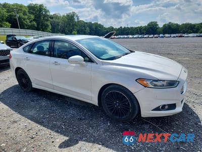 Czwarte zdjęcie samochodu z boku: 2016 FORD FUSION SE VIN:3FA6P0H9XGR130313 - miniatura