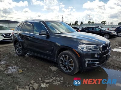 Czwarte zdjęcie samochodu z boku: 2018 BMW X5 XDR40E VIN:5UXKT0C57J0W00344 - miniatura