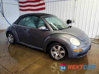 Czwarte zdjęcie samochodu z boku: 2006 VOLKSWAGEN NEW BEETLE CONVERTIBLE VIN:3VWPG31Y36M333487 - miniatura