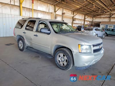 Czwarte zdjęcie samochodu z boku: 2010 CHEVROLET TAHOE C1500 LS VIN:1GNMCAE3XAR168802 - miniatura