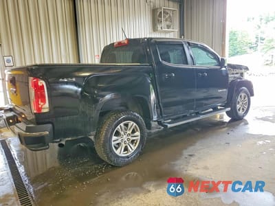 Trzecie zdjęcie samochodu z tyłu: 2019 GMC CANYON SLE VIN:1GTG6CEN7K1327852 - miniatura