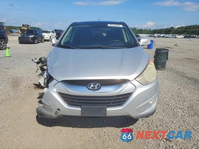 Piąte zdjęcie samochodu w środku: 2011 HYUNDAI TUCSON LIMITED VIN:KM8JU3AC7BU191555 - miniatura
