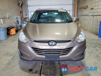 Piąte zdjęcie samochodu w środku: 2011 HYUNDAI TUCSON GLS VIN:KM8JUCAC8BU136449 - miniatura
