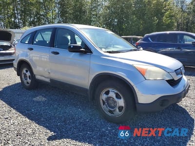 Czwarte zdjęcie samochodu z boku: 2009 HONDA CR-V LX VIN:3CZRE38329G704390 - miniatura