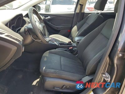 Zdjęcie 7 z 12 samochodu: 2016 FORD FOCUS SE VIN:1FADP3K27GL358773 - miniatura