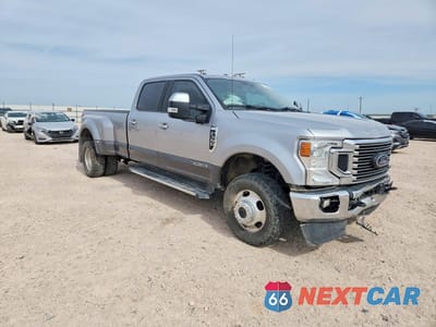 Czwarte zdjęcie samochodu z boku: 2021 FORD F350 SUPER DUTY VIN:1FT8W3DT3MEC37047 - miniatura