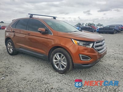 Czwarte zdjęcie samochodu z boku: 2017 FORD EDGE SEL VIN:2FMPK3J92HBC59621 - miniatura