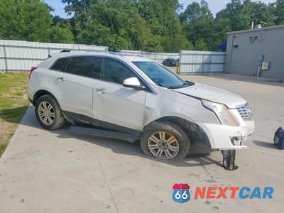 Czwarte zdjęcie samochodu z boku: 2013 CADILLAC SRX LUXURY COLLECTION VIN:3GYFNCE3XDS597568 - miniatura