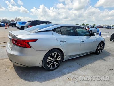 Trzecie zdjęcie samochodu z tyłu: 2016 NISSAN MAXIMA PLATINUM VIN:1N4AA6AP3GC429437 - miniatura