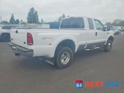 Trzecie zdjęcie samochodu z tyłu: 2000 FORD F350 SUPER DUTY VIN:1FTWX33S8YED76352 - miniatura