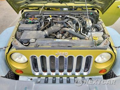 Zdjęcie 11 z 12 samochodu: 2010 JEEP WRANGLER SPORT VIN:1J4AA2D16AL207681 - miniatura