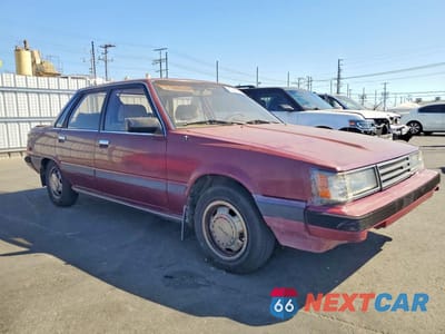 Czwarte zdjęcie samochodu z boku: 1986 TOYOTA CAMRY LE VIN:JT2SV16E6G0408976 - miniatura