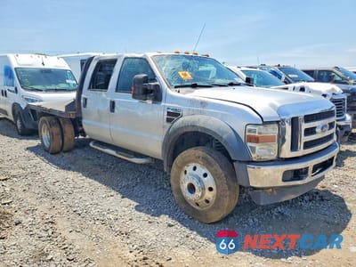 Czwarte zdjęcie samochodu z boku: 2010 FORD F450 SUPER DUTY VIN:1FDAW4HR6AEA26888 - miniatura