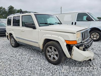 Czwarte zdjęcie samochodu z boku: 2006 JEEP COMMANDER LIMITED VIN:1J8HH58NX6C179429 - miniatura