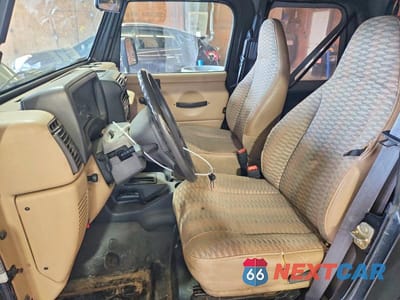 Zdjęcie 7 z 14 samochodu: 1999 JEEP WRANGLER / TJ SE VIN:1J4FY29P3XP466242 - miniatura