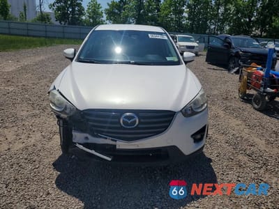 Piąte zdjęcie samochodu w środku: 2016 MAZDA CX-5 TOURING VIN:JM3KE4CY2G0728293 - miniatura