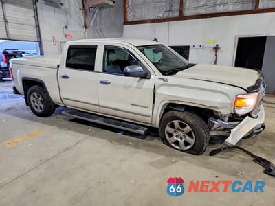 Czwarte zdjęcie samochodu z boku: 2014 GMC SIERRA K1500 SLT VIN:3GTU2VEC8EG306104 - miniatura