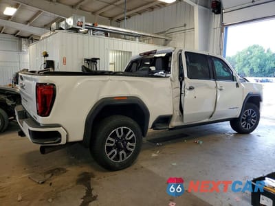 Trzecie zdjęcie samochodu z tyłu: 2023 GMC SIERRA K3500 AT4 VIN:1GT49VEY8PF232582 - miniatura