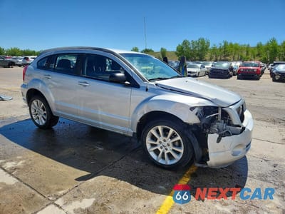 Czwarte zdjęcie samochodu z boku: 2011 DODGE CALIBER HEAT VIN:1B3CB5HA7BD256831 - miniatura
