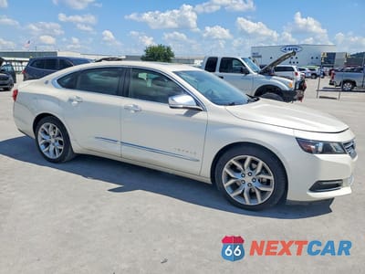 Czwarte zdjęcie samochodu z boku: 2014 CHEVROLET IMPALA LTZ VIN:1G1155S3XEU162821 - miniatura