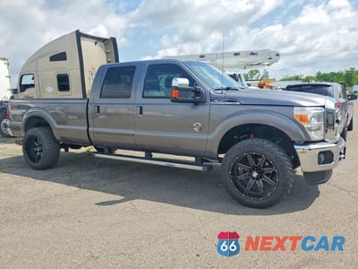 Czwarte zdjęcie samochodu z boku: 2012 FORD F350 SUPER DUTY VIN:1FT8W3BT5CEC83500 - miniatura