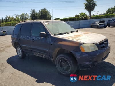 Czwarte zdjęcie samochodu z boku: 2004 MAZDA TRIBUTE DX VIN:4F2YZ02B34KM03925 - miniatura