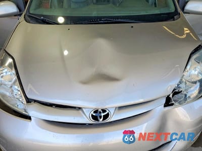 Zdjęcie 12 z 13 samochodu: 2009 TOYOTA SIENNA XLE VIN:5TDZK22C19S235067 - miniatura