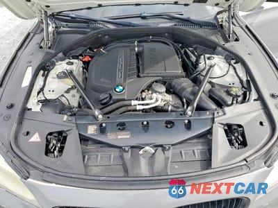 Zdjęcie 11 z 12 samochodu: 2015 BMW 740 LI VIN:WBAYE4C57FD139009 - miniatura