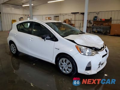 Czwarte zdjęcie samochodu z boku: 2012 TOYOTA PRIUS C TWO VIN:JTDKDTB34C1017694 - miniatura