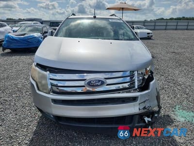 Piąte zdjęcie samochodu w środku: 2010 FORD EDGE SEL VIN:2FMDK3JC1ABB35120 - miniatura