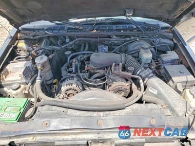 Zdjęcie 11 z 12 samochodu: 2001 GMC JIMMY VIN:1GKCT18W31K254864 - miniatura