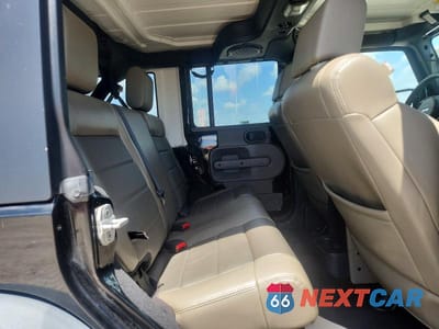 Zdjęcie 11 z 13 samochodu: 2010 JEEP WRANGLER UNLIMITED RUBICON VIN:1J4HA6H12AL187929 - miniatura