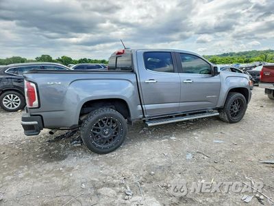 Trzecie zdjęcie samochodu z tyłu: 2020 GMC CANYON SLT VIN:1GTG6DEN5L1104233 - miniatura