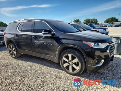 Czwarte zdjęcie samochodu z boku: 2019 CHEVROLET TRAVERSE LT VIN:1GNEVHKW9KJ229482 - miniatura