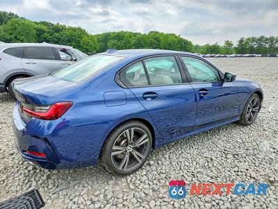 Trzecie zdjęcie samochodu z tyłu: 2023 BMW 330XI VIN:3MW89FF02P8D09310 - miniatura