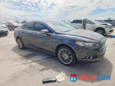 Czwarte zdjęcie samochodu z boku: 2015 FORD FUSION SE VIN:3FA6P0HDXFR288427 - miniatura