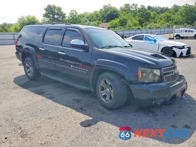 Czwarte zdjęcie samochodu z boku: 2007 CHEVROLET SUBURBAN K1500 VIN:3GNFK16397G143814 - miniatura