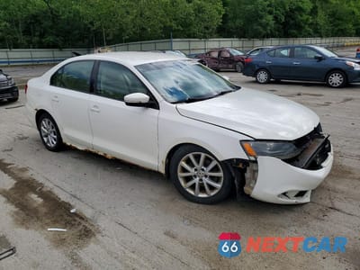 Czwarte zdjęcie samochodu z boku: 2011 VOLKSWAGEN JETTA SE VIN:3VWDZ7AJ4BM354656 - miniatura