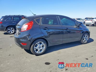 Trzecie zdjęcie samochodu z tyłu: 2014 FORD FIESTA SE VIN:3FADP4EJXEM107427 - miniatura