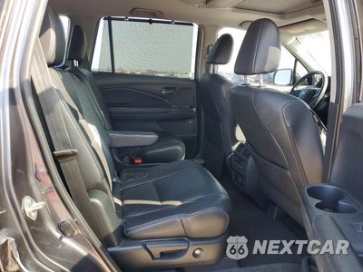 Zdjęcie 11 z 13 samochodu: 2020 HONDA PILOT TOURING VIN:5FNYF5H64LB000595 - miniatura