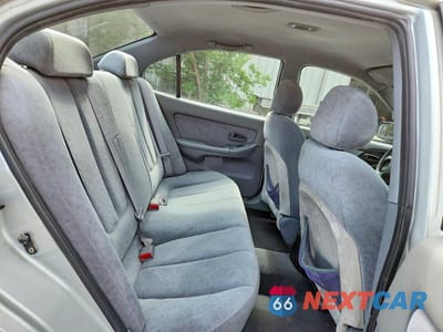 Zdjęcie 10 z 12 samochodu: 2004 HYUNDAI ELANTRA GLS VIN:KMHDN46D94U863894 - miniatura