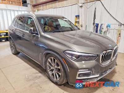 Czwarte zdjęcie samochodu z boku: 2021 BMW X5 XDRIVE45E VIN:5UXTA6C06M9E49226 - miniatura