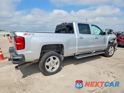 Trzecie zdjęcie samochodu z tyłu: 2015 CHEVROLET SILVERADO K2500 HEAVY DUTY LTZ VIN:1GC1KWE81FF670114 - miniatura