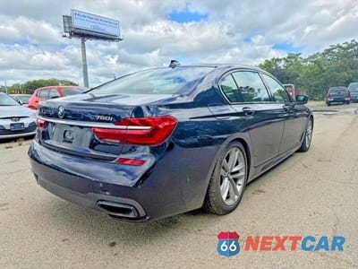 Czwarte zdjęcie samochodu z boku: 2017 BMW 750 XI VIN:WBA7F2C51HG421483 - miniatura