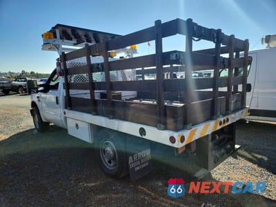 Trzecie zdjęcie samochodu z tyłu: 2009 FORD F350 SUPER DUTY VIN:1FDSF34519EA94710 - miniatura