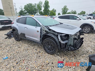 Czwarte zdjęcie samochodu z boku: 2025 SUBARU CROSSTREK WILDERNESS VIN:4S4GUHU60S3767957 - miniatura