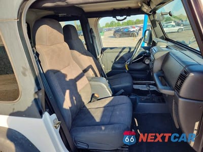 Zdjęcie 7 z 13 samochodu: 2003 JEEP WRANGLER / TJ SPORT VIN:1J4FA49S23P371332 - miniatura
