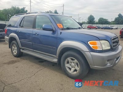 Czwarte zdjęcie samochodu z boku: 2002 TOYOTA SEQUOIA SR5 VIN:5TDBT44AX2S073211 - miniatura
