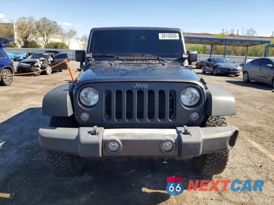 Piąte zdjęcie samochodu w środku: 2017 JEEP WRANGLER SPORT VIN:1C4AJWAG4HL640044 - miniatura
